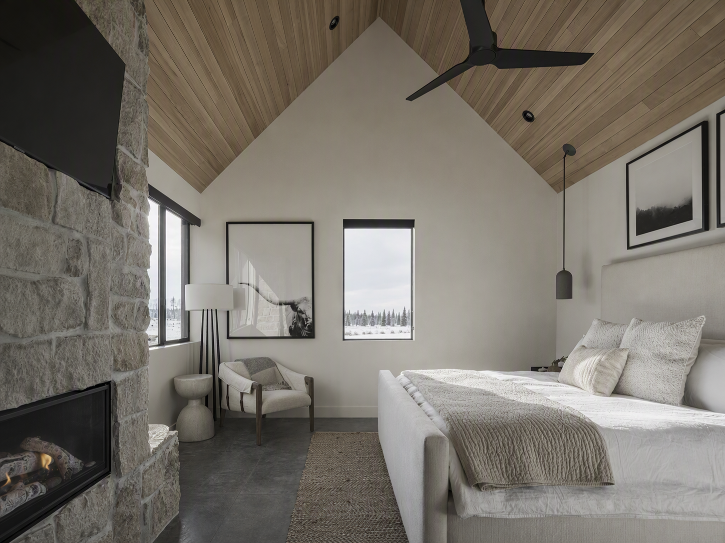 A modern minimalist bedroom with a vaulted ceiling clad in light wood planks, featuring a large bed with white linen bedding and textured beige throw — rustic bedroom ideas reference 1